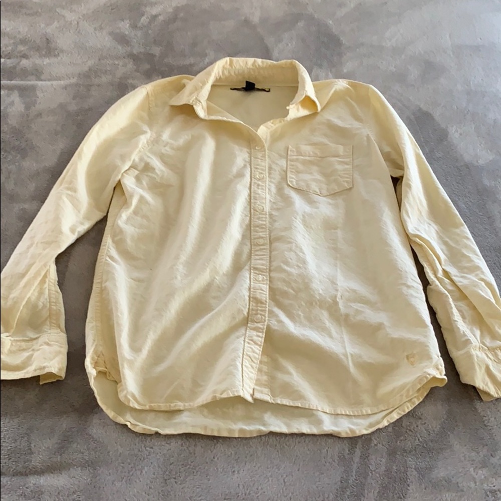 Yellow collared button down shirt